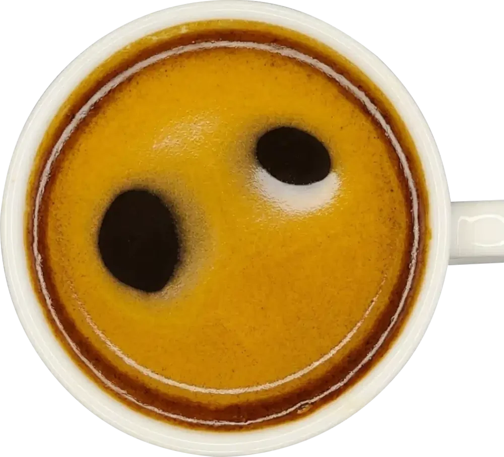 Detailní záběr na šálek hotového espressa s vanilkovým aroma